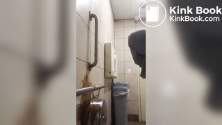 Woman has diarrhea on bathroom wall