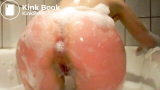 Cute girl takes dump in bathwater