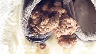 Girl squishes toes in shit