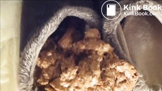 Girl squishes toes in shit