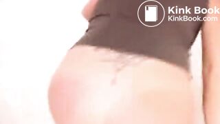 Woman shitting in tub closeup