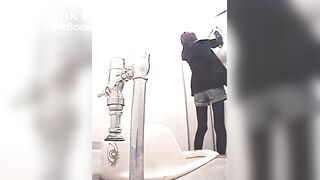 A Japanese girl has diarrhea in a park toilet.