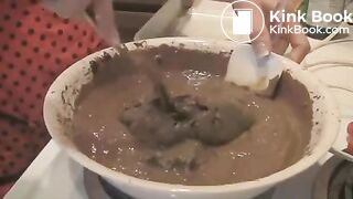 Girl shit and makes brownies with iy