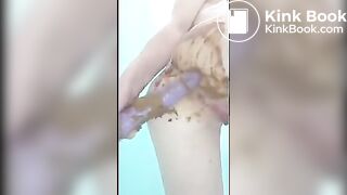 Teenage scat whore plays with dildo