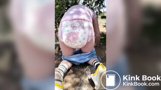 cute girl messing diaper - video 2