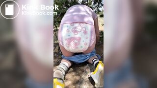 cute girl messing diaper - video 2