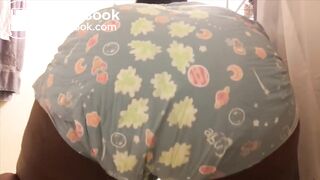 Cute black girl messes diaper