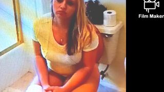 Sexy girl sitting on the toilet