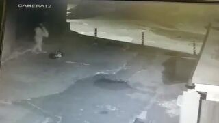 Girl caught shitting outside on CCTV