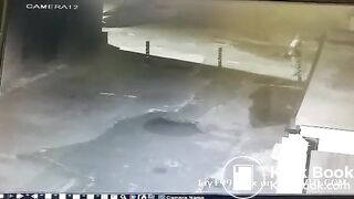 Girl caught shitting outside on CCTV