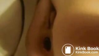 Constipated girl forcing out a hard shit