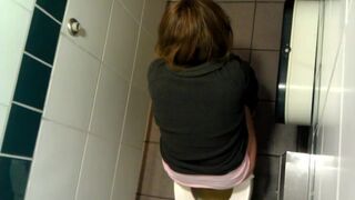 Spy girl pooping at public toilet - 2