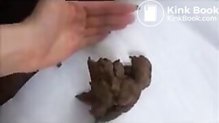 Cutie Marvels at Her Droppings