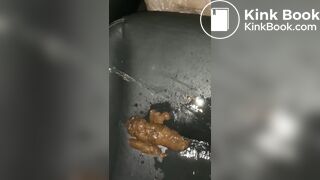 Pissing on her shit