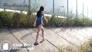 Messing purple shorts outside