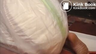 Girl poops diaper and plastic pants 1