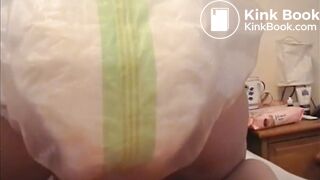 Girl poops diaper and plastic pants 1