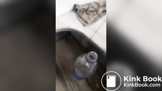 Girl making scat and piss cocktail