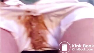 Girl shitting in white jeans