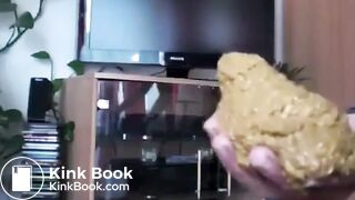 Young girl shits in hand