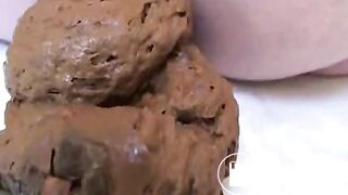 Thick blonde girl makes a big dump