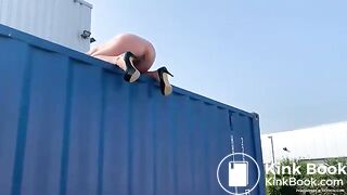 Blond Woman Shits Off A Storage Container