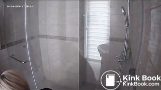 A blonde chick takes a shit in bathroom (mirror)