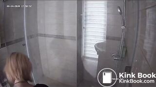 A blonde chick takes a shit in bathroom (mirror)