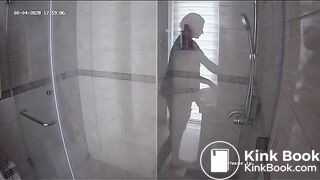 A blonde chick takes a shit in bathroom (mirror)