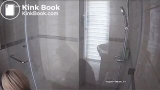 A blonde chick takes a shit in bathroom (mirror)