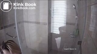 A blonde chick takes a shit in bathroom (mirror)