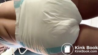 Girl gets an enema and messes diaper