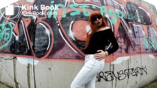 a vacant lot near residential buildings is a toilet for her