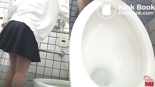 Asian girl pooping above toilet 1