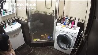 A young chick pooping in bathroom while using phone