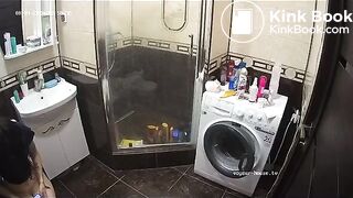 A young chick pooping in bathroom while using phone