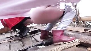 Girls shitting in floor toilet at concert