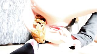Girl masturbating while pooping a big one