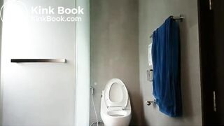 standing pooping over toilet