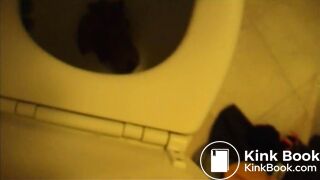 Clumsy woman with cleaner camera lens poops