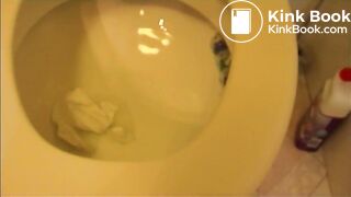 Clumsy woman with cleaner camera lens poops