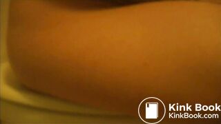 Clumsy woman with cleaner camera lens poops