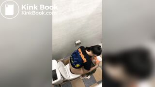 Thai womam pooping in toilet