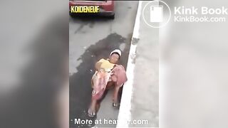 Woman pooping gets knocked over