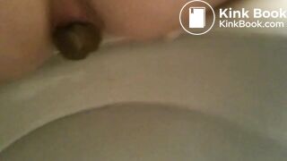 Scat closeup on bowl rear view