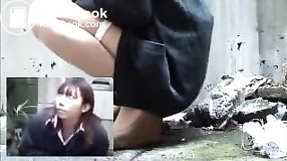 Asian girls pooping in the street - video 2