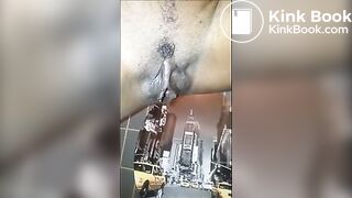 Ebony shitting and pissing over toilet