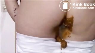 Girl shitting in white jeans