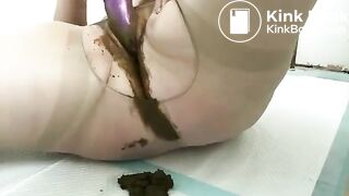 Girl fucks her pussy with a shitty dildo