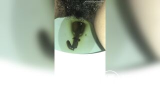 Latin girl takes a long poop